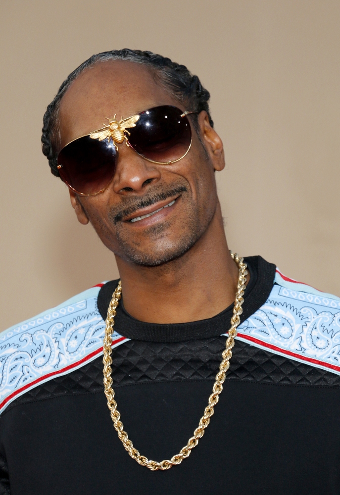 Snoop Dogg smiles for camera.