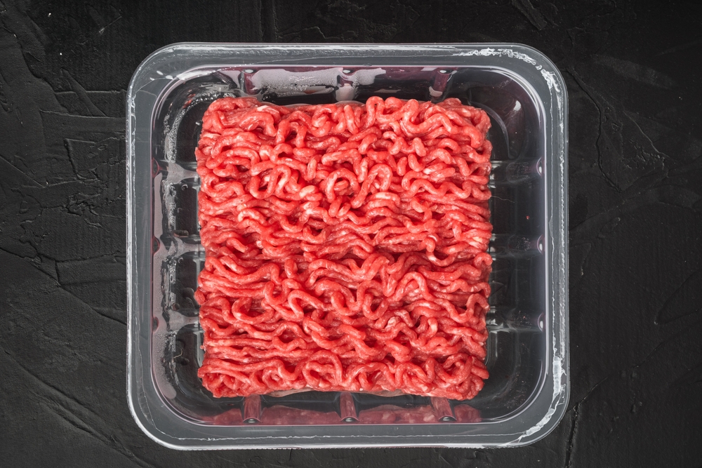 A contained of ground beef. 