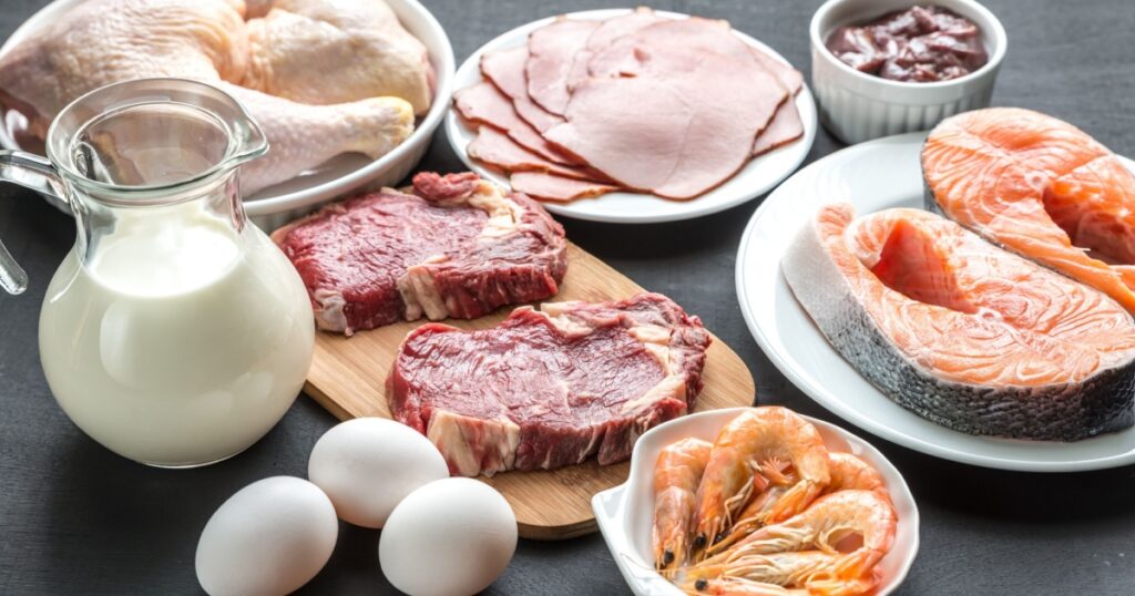 Protein diet: raw products on the wooden background