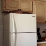 Here’s what the cupboards above your fridge are for