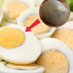 Why does a green ring appear around hard-boiled eggs?