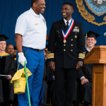 Because His Son Was Ashamed of His Father’s Job, the Janitor Stood Quietly Watching His Son Graduate – But Suddenly He Was Invited to the Stage for Recognition, Shocking Everyone.