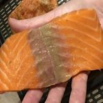 I bought salmon a week ago and wanted to make it for dinner today. When I took it out of the refrigerator, it had a yellow stain on it. What is it?