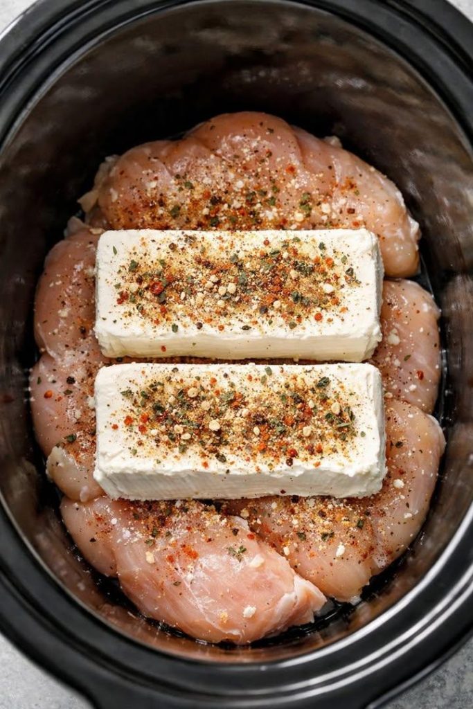 Put raw chicken breasts in the crock pot, top with blocks of cream cheese, and get a meal so delicious your family will be begging for more.