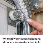 White powder keeps collecting along my garage door tracks in winter. What is it?