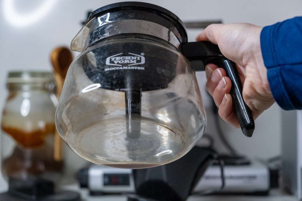 What Is the Chalky White Buildup Inside a Coffee Maker Water Tank?