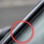 Most Drivers Have No Idea What the Little Black Dots on a Windshield Actually Do