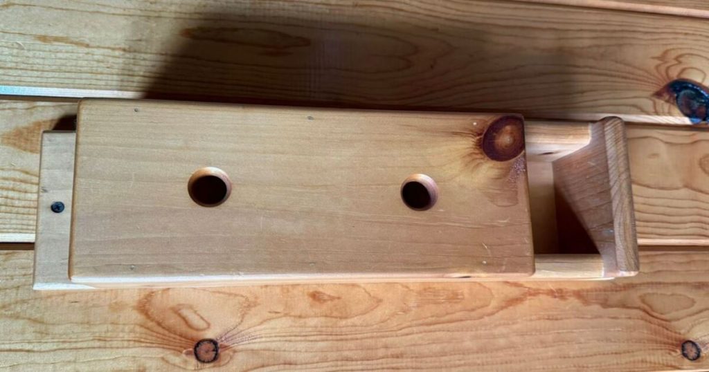 Why So Many 1970s Cabins Had This Small Wooden Box on the Wall