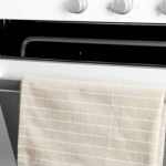 Why You Should Not Keep a Kitchen Towel on the Oven Door