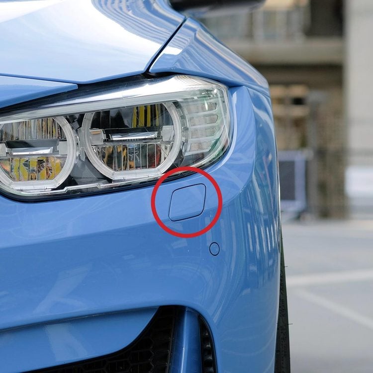 What That Small Panel on Your Car’s Front Bumper Is Really For