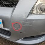 Why There’s a Small Panel on Your Car’s Bumper