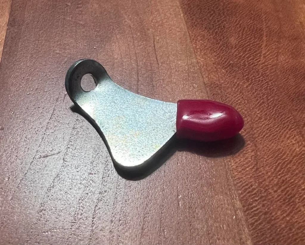 What Is This Metal Tab Found in the Laundry? It’s Probably Not from Your Washer or Dryer