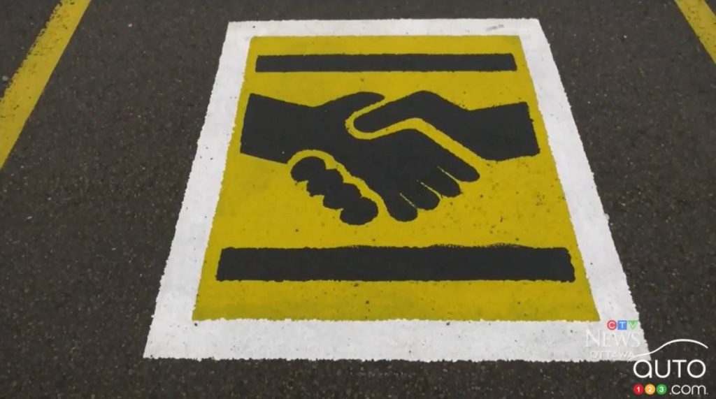 What the Handshake Symbol on a Parking Space Really Means